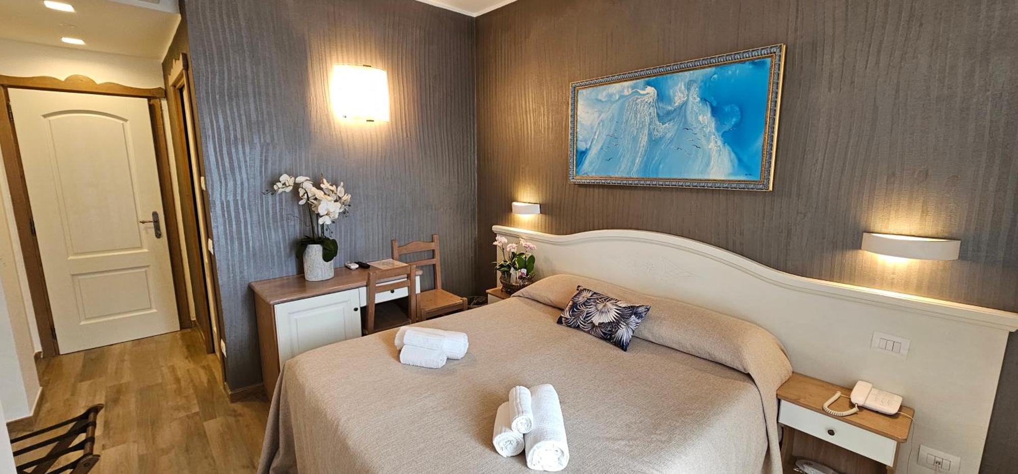 Hotel Meridiana Беллано Номер фото